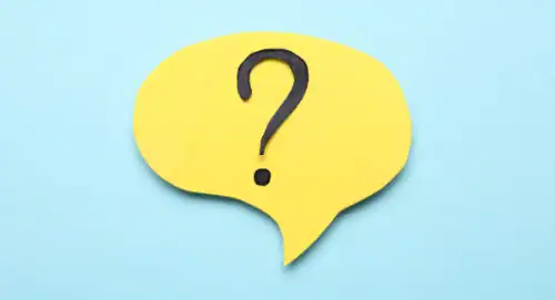 Question Mark on a yellow piece of paper, implying the question of what should be on a church website